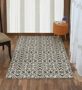 Machine washable cream rug with floral and geometric design.